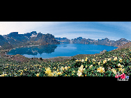 Tianchi Lake or Heaven Lake is a crater lake perched atop the Changbai Mountains in northeast China's Jilin Province. It is believed to be a holy lake by the locals and its scenery varies greatly as the season changes. [Courtesy of Changbai Mountain Tourist Administration]