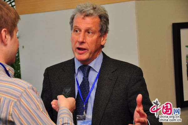 Dr. Keith Mitchelson , Vice President of CapitalBio Corporation talks to China.org.cn reporter Corey Cooper at the TB Forum hosted by the Global Business Council on HIV/AIDS, Tuberculosis and Malaria in Beijing on March 22, 2011.