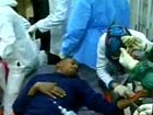 Wounded civilians shown on Libyan TV