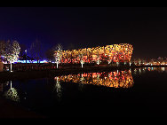 The National Stadium, as the main track and field stadium for the 2008 Olympics Games, is dubbed the 'bird's nest' because of its innovative grid formation.The stadium was begun in March 2004 and finished in March 2008. It was built with 36 kilometers of unwrapped steel, with a combined weight of 45,000 tonnes. Covering over 258,000 square meters, the stadium has at least 100,000 seats. [manqingwangye/jingnei.net] 