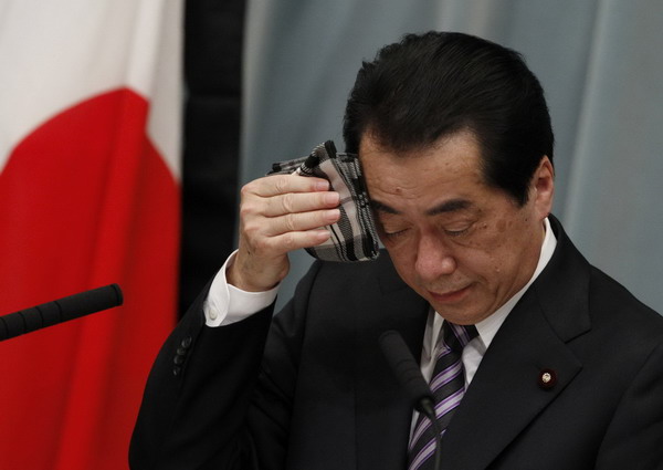 Japan's PM vows to win battle against nuke plant