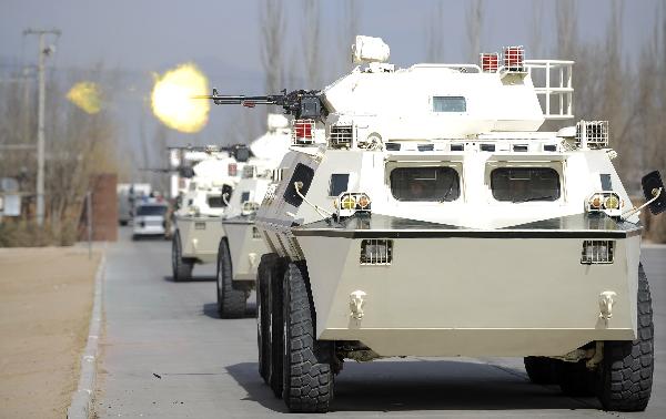 Armed policemen take part in drill in NW China's Yinchuan