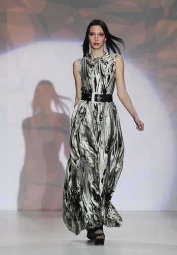 A model presents a creation during a catwalk show by designer Khavaarapieva at fashion week in Moscow April 2, 2011. 