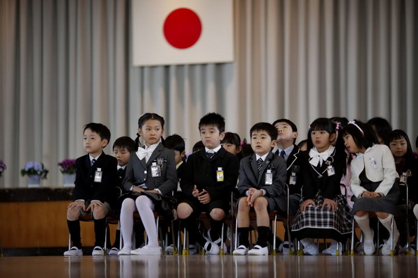 Schools re-open in Japan&apos;s quake zone
