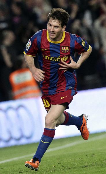 Barcelona's Lionel Messi celebrates a goal against Almeria during their Spanish first division soccer match at Camp Nou stadium in Barcelona April 9, 2011. [Xinhua]