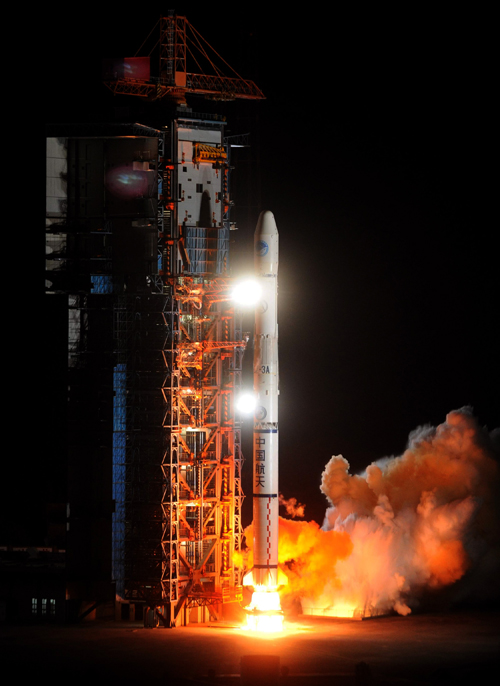 A Long March-3A carrier rocket lifts off at the Xichang Satellite Launch Center in southwest China's Sichuan Province, Apr. 10, 2011. China successfully launched into space a eighth orbiter for its independent satellite navigation and positioning network known as Beidou, or Compass System Saturday. [Xinhua photo]