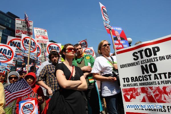 Anti-war demonstrators participate in a rally on Union Square in New York, the United States, April 9, 2011. 