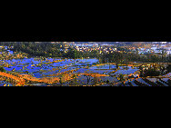 Photo shows the terrace field in Yuanyang county of southwest China's Yunnan Province. The terrace field in Yuanyang where people of Hani ethnic group live covers an area of some 113 square kilometers. [拂锺无声/forums.nphoto.net]
