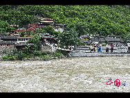 Luding Bridge is located in Ganzi Zang Autonomous Prefecture of Sichuan Province. It was originally built in 1705 during the Reign of Emperor Kangxi in Qing Dynasty, and completed in 1706. It became famous after the Long March. [China.org.cn]
