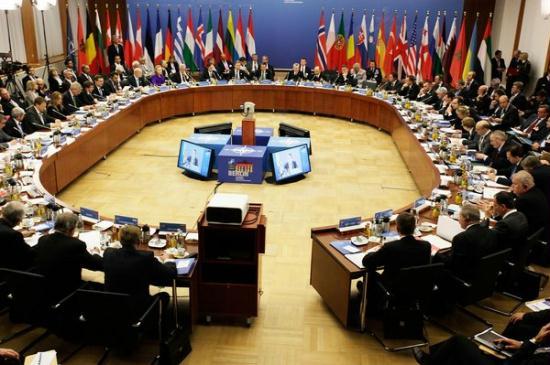 Round table at an informal meeting of NATO member foreign ministers on April 14, 2011 in Berlin, Germany. The principal focus of the two-day meeting will be the alliances military involvement in the war in Libya, though it also includes special roundtables on the alliances relationship to Russia, Ukraine and Georgia. [Carsten Koall/Getty Images]