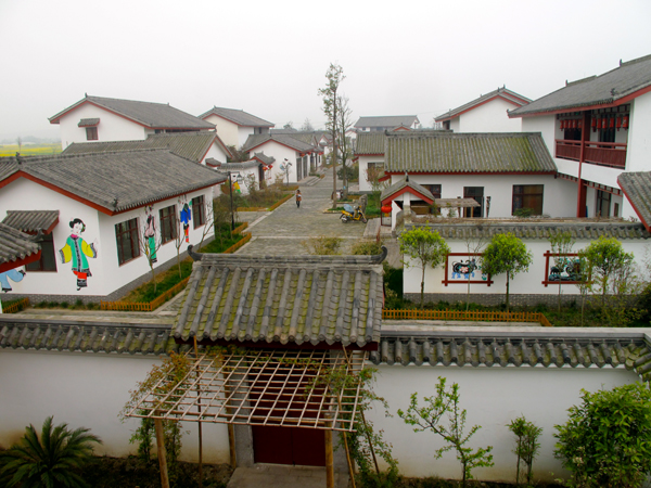 Shejiantai village in Sichuan's Mianzhu city has been rebuilt into a picturesque tourism zone after the quake damaged its squalid housing. The exteriors of its 2,700 homes are now adorned with the lunar new year's folkart for which the settlement is famous. [China Daily]