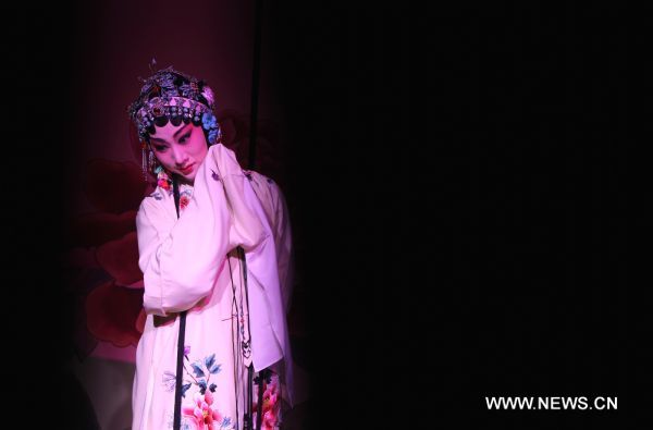 An actress from China's Shanghai Kunju Opera Company performs the Kunqu opera 'The Peony Pavilion' during the Shanghai Culture Month in Paris, capital of France, April 18, 2011. 'The Peony Pavilion' is a love story about Du Liniang, daughter of a wealthy official, and Liu Mengmei, a talented but poor young scholar. (Xinhua/Gao Jing) (wjd) 