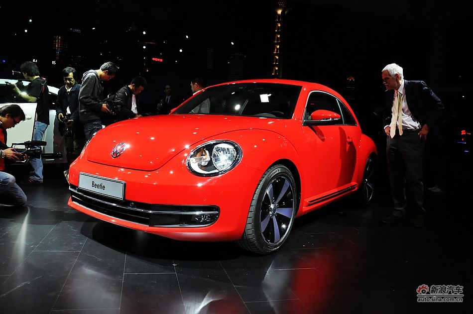 The New Beetle is unveiled at the 2011 Shanghai Auto Show. Started from April 20, 2011, more than 1,000 car models from about 20 countries are on display at the show and 75 of them are making their world premiere.