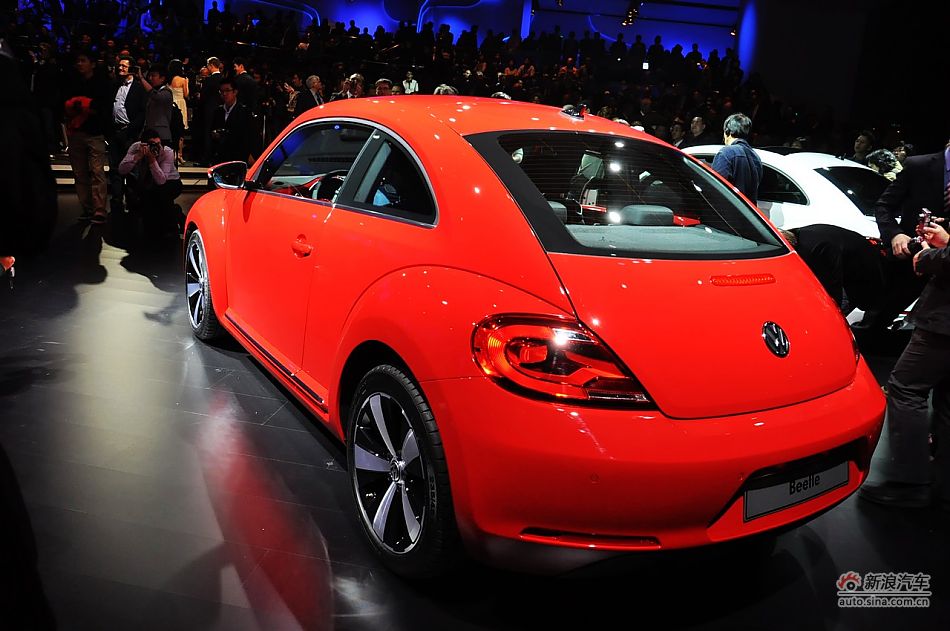 The New Beetle is unveiled at the 2011 Shanghai Auto Show. Started from April 20, 2011, more than 1,000 car models from about 20 countries are on display at the show and 75 of them are making their world premiere.