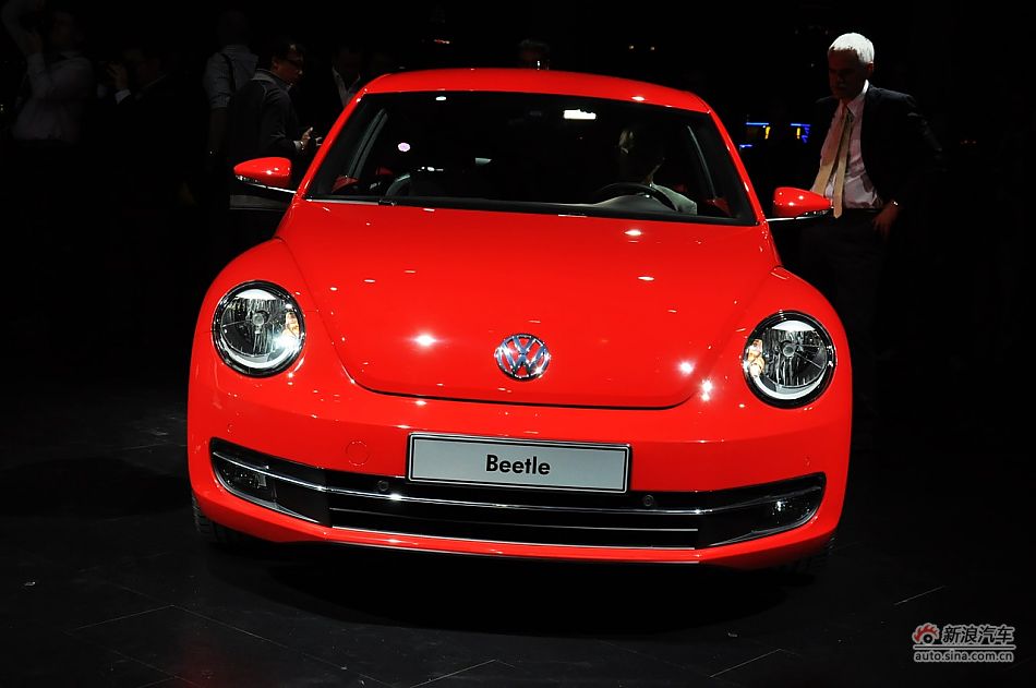 The New Beetle is unveiled at the 2011 Shanghai Auto Show. Started from April 20, 2011, more than 1,000 car models from about 20 countries are on display at the show and 75 of them are making their world premiere.