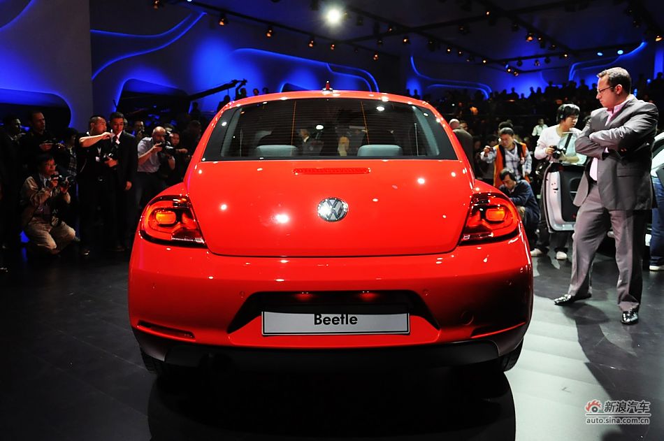 The New Beetle is unveiled at the 2011 Shanghai Auto Show. Started from April 20, 2011, more than 1,000 car models from about 20 countries are on display at the show and 75 of them are making their world premiere.