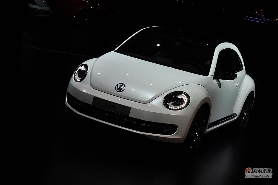 The New Beetle is unveiled at the 2011 Shanghai Auto Show. Started from April 20, 2011, more than 1,000 car models from about 20 countries are on display at the show and 75 of them are making their world premiere.