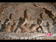 The Yungang Grottoes, with a history of more than 1,500 years, is one of the largest cave clusters in China. Located in the north cliff of Wuzhou Mountain, Datong, the grottoes, composed of 53 caves and over 51,000 stone statues, represent the Chinese Buddhist cave art from the period of 460-525 AD. It also encompasses Indian Buddhist art, Greek and Roman architectural characteristics, indicating ancient China's cultural exchange and relationship with diverse world civilizations.[China.org.cn]
