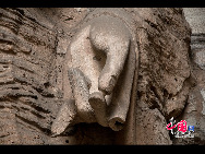 The Yungang Grottoes, with a history of more than 1,500 years, is one of the largest cave clusters in China. Located in the north cliff of Wuzhou Mountain, Datong, the grottoes, composed of 53 caves and over 51,000 stone statues, represent the Chinese Buddhist cave art from the period of 460-525 AD. It also encompasses Indian Buddhist art, Greek and Roman architectural characteristics, indicating ancient China's cultural exchange and relationship with diverse world civilizations.[China.org.cn]
