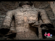 The Yungang Grottoes, with a history of more than 1,500 years, is one of the largest cave clusters in China. Located in the north cliff of Wuzhou Mountain, Datong, the grottoes, composed of 53 caves and over 51,000 stone statues, represent the Chinese Buddhist cave art from the period of 460-525 AD. It also encompasses Indian Buddhist art, Greek and Roman architectural characteristics, indicating ancient China's cultural exchange and relationship with diverse world civilizations.[China.org.cn]