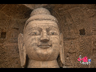 The Yungang Grottoes, with a history of more than 1,500 years, is one of the largest cave clusters in China. Located in the north cliff of Wuzhou Mountain, Datong, the grottoes, composed of 53 caves and over 51,000 stone statues, represent the Chinese Buddhist cave art from the period of 460-525 AD. It also encompasses Indian Buddhist art, Greek and Roman architectural characteristics, indicating ancient China's cultural exchange and relationship with diverse world civilizations.[China.org.cn]
