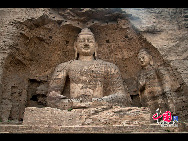 The Yungang Grottoes, with a history of more than 1,500 years, is one of the largest cave clusters in China. Located in the north cliff of Wuzhou Mountain, Datong, the grottoes, composed of 53 caves and over 51,000 stone statues, represent the Chinese Buddhist cave art from the period of 460-525 AD. It also encompasses Indian Buddhist art, Greek and Roman architectural characteristics, indicating ancient China's cultural exchange and relationship with diverse world civilizations.[China.org.cn]