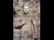 The Yungang Grottoes, with a history of more than 1,500 years, is one of the largest cave clusters in China. Located in the north cliff of Wuzhou Mountain, Datong, the grottoes, composed of 53 caves and over 51,000 stone statues, represent the Chinese Buddhist cave art from the period of 460-525 AD. It also encompasses Indian Buddhist art, Greek and Roman architectural characteristics, indicating ancient China's cultural exchange and relationship with diverse world civilizations.[China.org.cn]