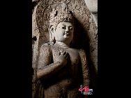 The Yungang Grottoes, with a history of more than 1,500 years, is one of the largest cave clusters in China. Located in the north cliff of Wuzhou Mountain, Datong, the grottoes, composed of 53 caves and over 51,000 stone statues, represent the Chinese Buddhist cave art from the period of 460-525 AD. It also encompasses Indian Buddhist art, Greek and Roman architectural characteristics, indicating ancient China's cultural exchange and relationship with diverse world civilizations.[China.org.cn]