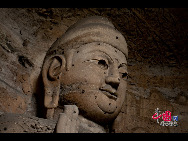 The Yungang Grottoes, with a history of more than 1,500 years, is one of the largest cave clusters in China. Located in the north cliff of Wuzhou Mountain, Datong, the grottoes, composed of 53 caves and over 51,000 stone statues, represent the Chinese Buddhist cave art from the period of 460-525 AD. It also encompasses Indian Buddhist art, Greek and Roman architectural characteristics, indicating ancient China's cultural exchange and relationship with diverse world civilizations.[China.org.cn]