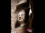 The Yungang Grottoes, with a history of more than 1,500 years, is one of the largest cave clusters in China. Located in the north cliff of Wuzhou Mountain, Datong, the grottoes, composed of 53 caves and over 51,000 stone statues, represent the Chinese Buddhist cave art from the period of 460-525 AD. It also encompasses Indian Buddhist art, Greek and Roman architectural characteristics, indicating ancient China's cultural exchange and relationship with diverse world civilizations.[China.org.cn]