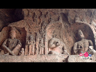 The Yungang Grottoes, with a history of more than 1,500 years, is one of the largest cave clusters in China. Located in the north cliff of Wuzhou Mountain, Datong, the grottoes, composed of 53 caves and over 51,000 stone statues, represent the Chinese Buddhist cave art from the period of 460-525 AD. It also encompasses Indian Buddhist art, Greek and Roman architectural characteristics, indicating ancient China's cultural exchange and relationship with diverse world civilizations.[China.org.cn]