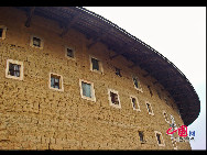 Photo shows the Tianluokeng Tulou, earth buildings in Chinese, in Nanjing County, southeast China's Fujian Province. Built on a base of stone, the thick walls of Tulou were packed with dirt and fortified with wood or bamboo internally. The architectural arts of the Fujian Tulou can be traced back nearly 1,000 years, and their design incorporates the tradition of fengshui (favorable siting within the environment). [China.org.cn] 