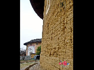 Photo shows the Tianluokeng Tulou, earth buildings in Chinese, in Nanjing County, southeast China's Fujian Province. Built on a base of stone, the thick walls of Tulou were packed with dirt and fortified with wood or bamboo internally. The architectural arts of the Fujian Tulou can be traced back nearly 1,000 years, and their design incorporates the tradition of fengshui (favorable siting within the environment). [China.org.cn] 