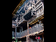 Photo shows the Tianluokeng Tulou, earth buildings in Chinese, in Nanjing County, southeast China's Fujian Province. Built on a base of stone, the thick walls of Tulou were packed with dirt and fortified with wood or bamboo internally. The architectural arts of the Fujian Tulou can be traced back nearly 1,000 years, and their design incorporates the tradition of fengshui (favorable siting within the environment). [China.org.cn] 