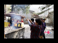 The Pool and Cudrania Temple, or Tanzhe Si, is situated 45 kilometers west of the city. The Chinese have a centuries old proverb; 'First there was the Pool and Cudrania Temple, then came Beijing.' This structure dates back 1,600 years to the Jin Dynasty, when it was known as the Temple of Auspicious Fortune. During the Tang Dynasty the grounds were expanded and renamed the Dragon Spring Temple. [China.org.cn]
