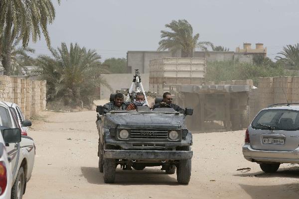 Libyan rebels are seen in Misrata, Libya, April 22, 2011. Misrata is the only major city in western Libya still under control of opposition forces.[Xinhua]
