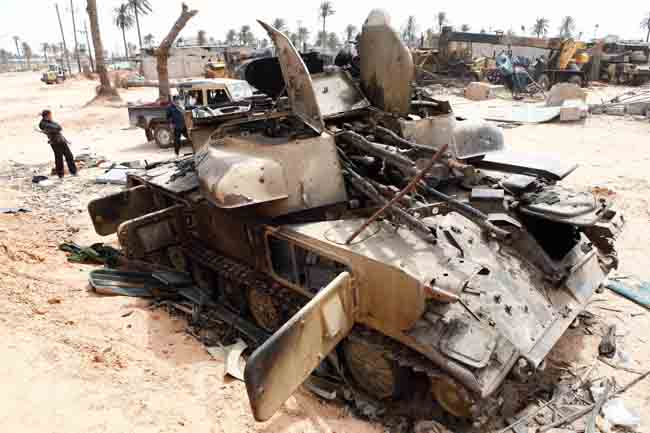 Tanks and other military vehicles abandoned by pro-Gaddafi troops are seen in Misrata, Libya, April 22, 2011. Misrata is the only major city in western Libya still under control of opposition forces. [Xinhua] 