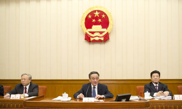 Wu Bangguo (C), chairman of the Standing Committee of the National People's Congress (NPC), presides over the closing meeting of the 20th session of the Standing Committee of the 11th NPC in Beijing, capital of China, April 22, 2011. The bimonthly NPC session came to a conclusion here Friday. [Xinhua]