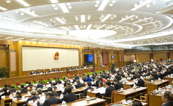 Wu Bangguo, chairman of the Standing Committee of the National People's Congress (NPC), presides over the closing meeting of the 20th session of the Standing Committee of the 11th NPC in Beijing, capital of China, April 22, 2011. The bimonthly NPC session came to a conclusion here Friday. [Xinhua]