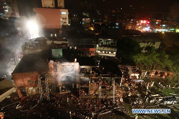 Photo taken on April 22, 2011 shows an explosion site in Xinbei City, southeast China&apos;s Taiwan. An explosion at a paper mill occurred Friday evening in Xinbei City of Taiwan, leaving at least 4 people dead and another 33 injured. [Xinhua]