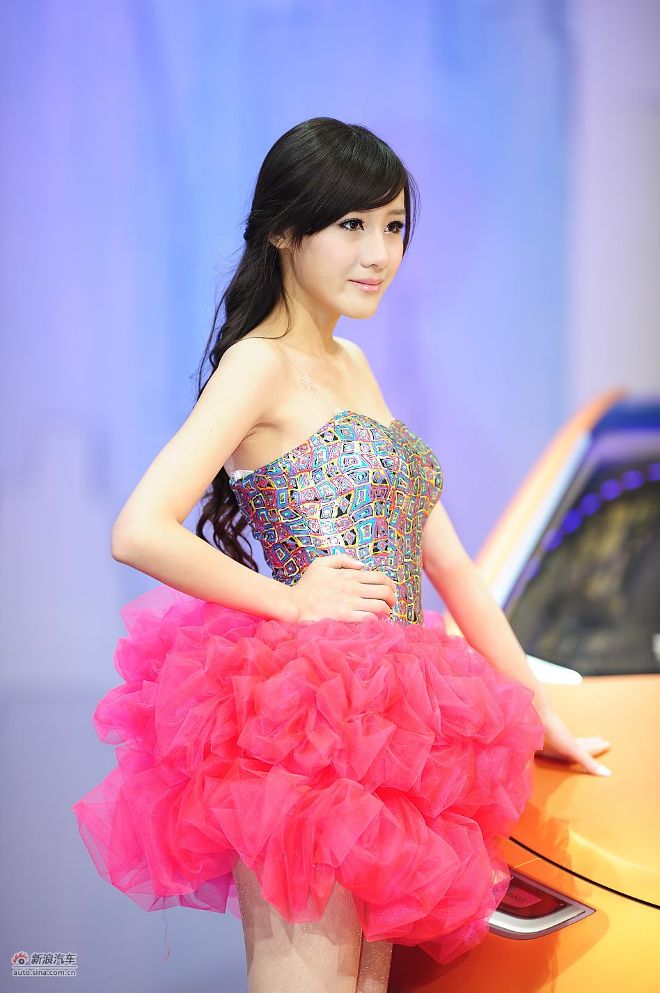 Model poses for Changan PSA at Auto Shanghai 2011, the 14th Shanghai International Automobile Industry Exhibition, which opens in the city&apos;s new International Expo Center from April 19-28. [Sina]