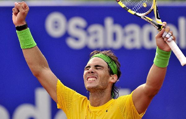 Spanish Rafael Nadal celebrates after winning the final match against compatriot David Ferrer during the Barcelona Open tennis tournament in Barcelona. (Xinhua/AFP Photo) 