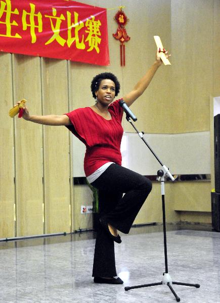 Marsha Louis performs during the 'Chinese Bridge' Southern American College and Middle School Students Chinese Language Contest in Houston, the United States, April 24, 2011.