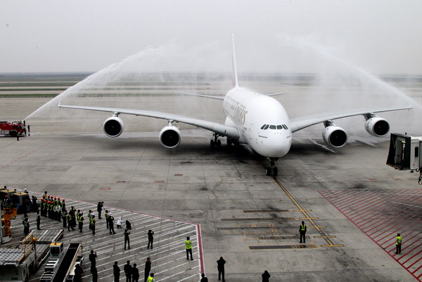 An Airbus A380 plane taxies on tarmac after touchdown at the Pudong International Airport in east China's Shanghai, April 27, 2011. The Emirates Flight EK302 is the first regular A380 air service to Shanghai. As the largest passenger plane in the world, the Airbus A380 seats up to 853 people at a cruising speed of up to 900 km/h or 560 mph.