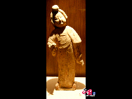 A colored pottery court lady of Tang Dynasty in Ningxia Museum. As one of the cradles of Chinese ancient civilization, Ningxia witnessed human activities as far back as some 30,000 years. [Elaine Duan/China.org.cn]