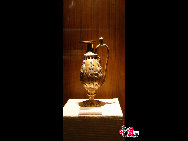 A gold-gilded silver ewer unearthed in 1983 from Guyuan of Ningxia Hui Autonomous Region. As one of the cradles of Chinese ancient civilization, Ningxia witnessed human activities as far back as some 30,000 years. [Elaine Duan/China.org.cn]