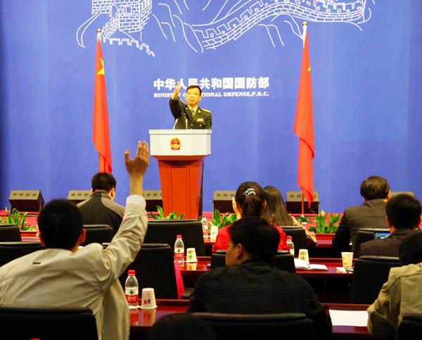 Defense Ministry spokesman Geng Yansheng hosts the ministry's first-ever regular press conference in Beijing, April 26, 2011. [Photo/Xinhua] 