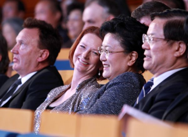 Chinese State Councilor Liu Yandong (2nd R) and Australian Prime Minister Julia Gillard (2nd L) watch an evening gala of western and Chinese cultures in Beijing, capital of China, April 27, 2011. 