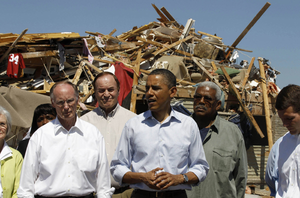 U.S. President Barack Obama speaks to the press while he examining damage caused by severe storms and tornadoes in the Tuscaloosa, Alabama April 29, 2011. [Xinhua/Reuters Photo]