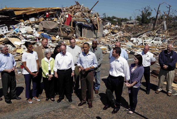 U.S. President Barack Obama speaks while he tours damage caused by devastating severe storms and tornadoes in the Tuscaloosa, Alabama, area, April 29, 2011. [Xinhua/Reuters Photo]